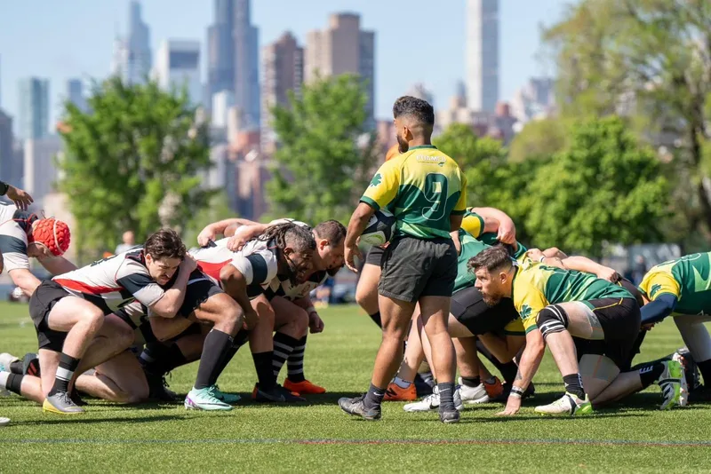 The Lions pack binds for a scrum with the Manhattan skyline behind them